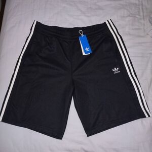 Adidas snap short, size XL, black with white stripes...